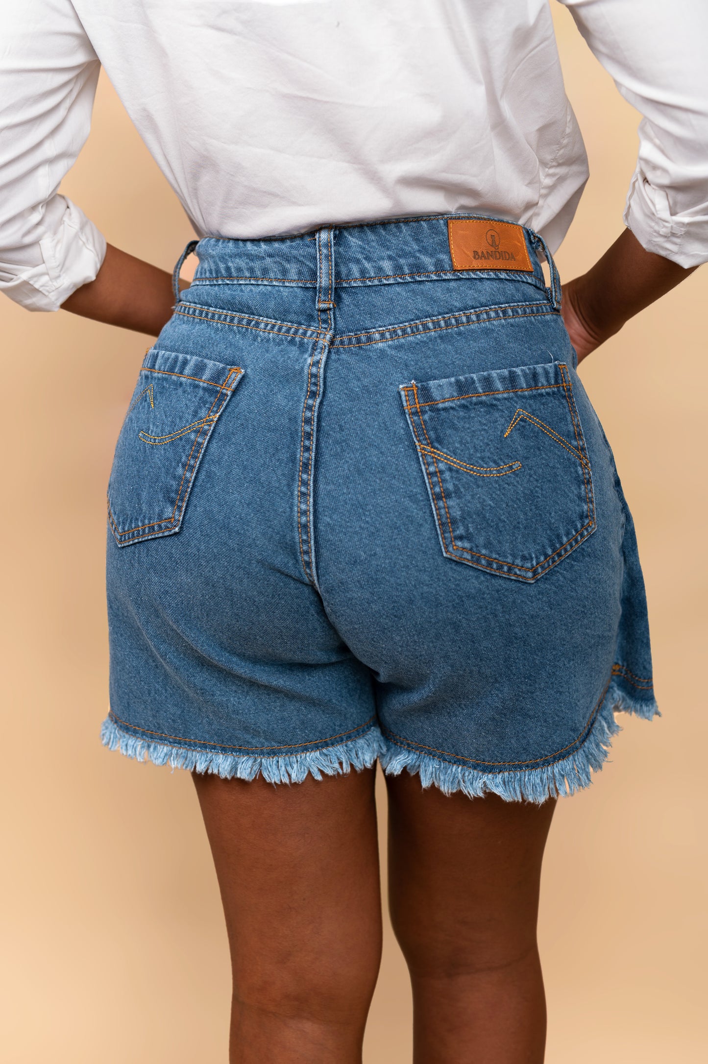 Short Cruzado, Candela